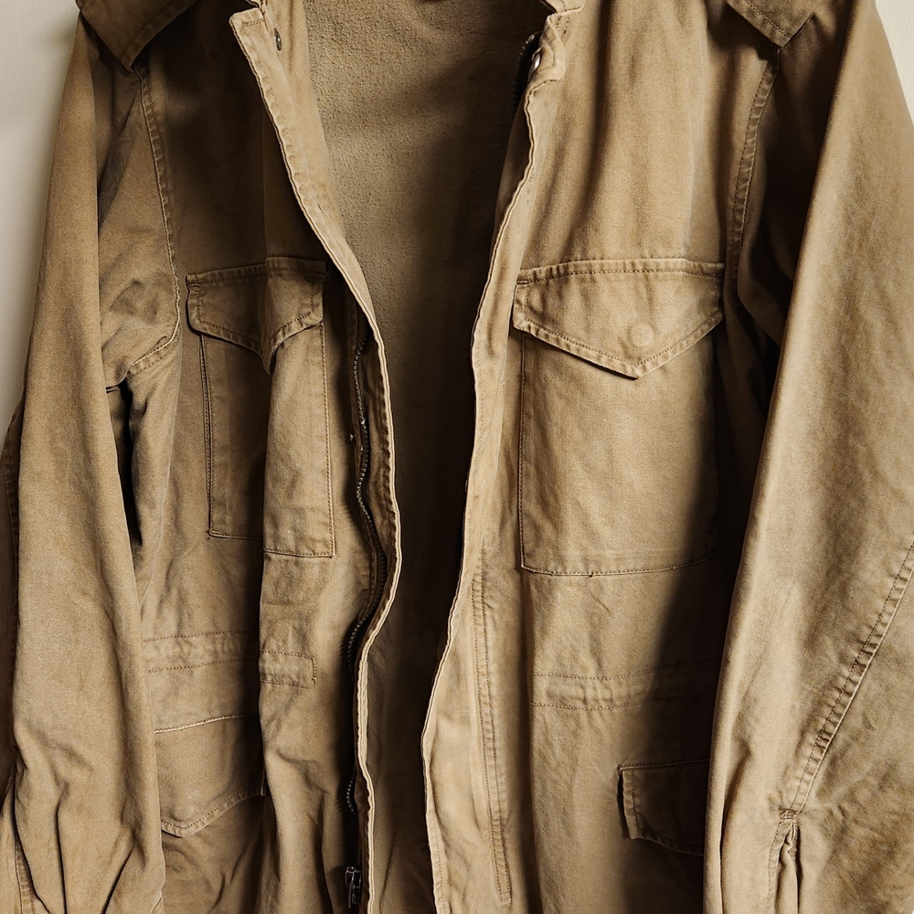 Tan Military Field Jacket with Rugged Fabric and Stand-Up Collar